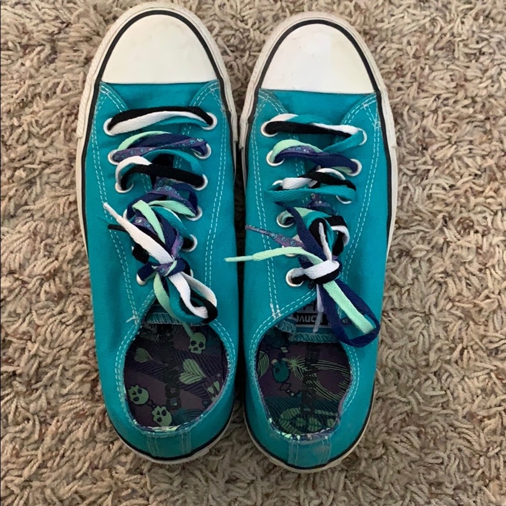 Converse turquoise low tops with multi color laces